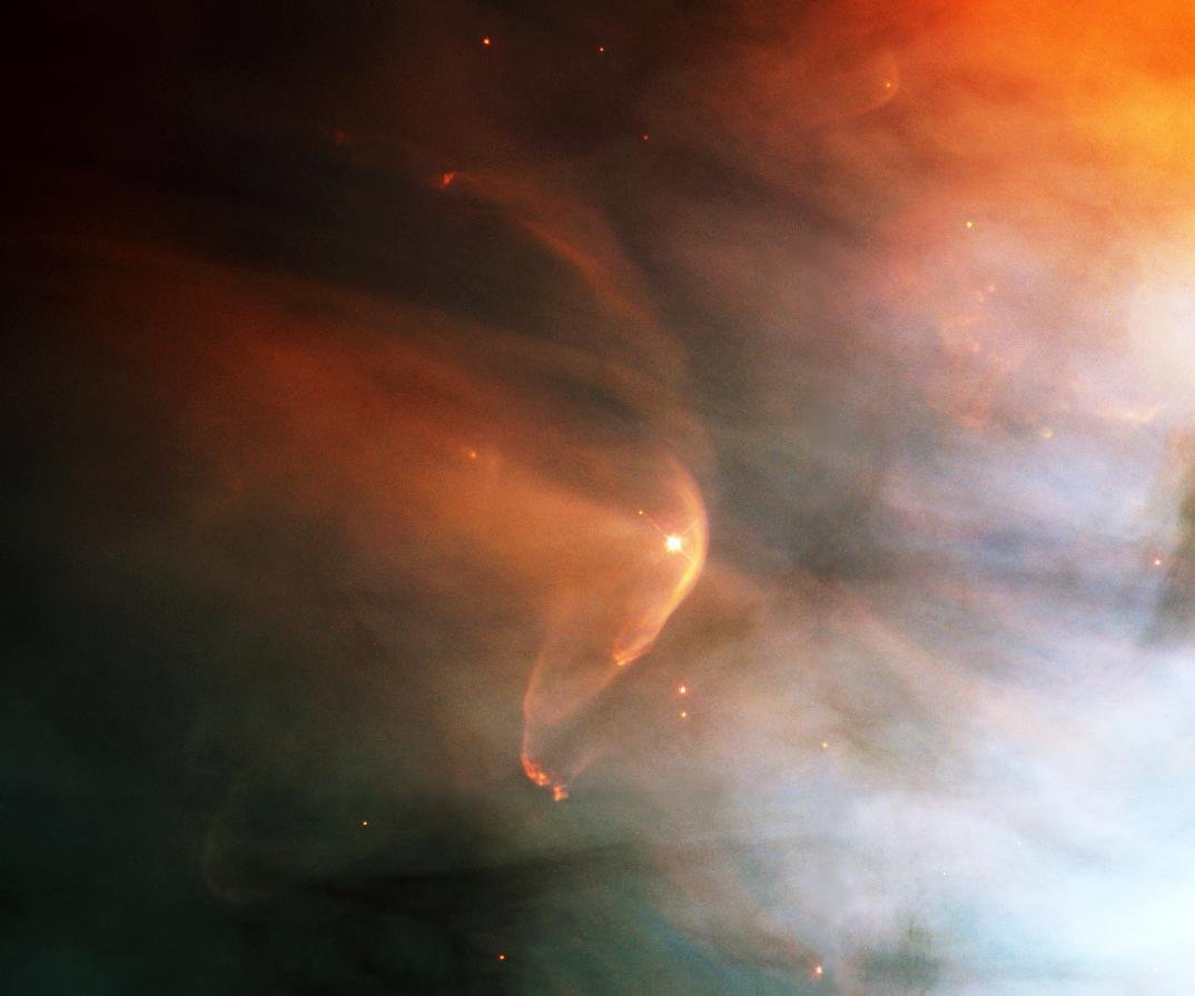 The Orion Nebula region, glowing clouds of hydrogen gas lit by newly formed stars.